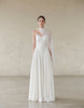 Bride-to-be in a strapless white LARMES Habiba gown with a corset bodice