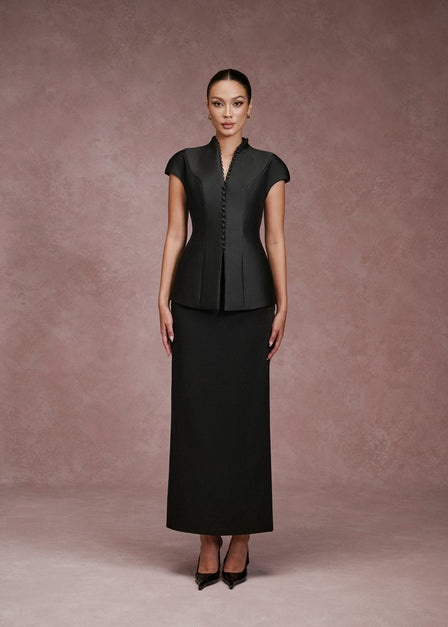 Black LARMES Victoria peplum top with hand-covered buttons and Irene ankle-length skirt