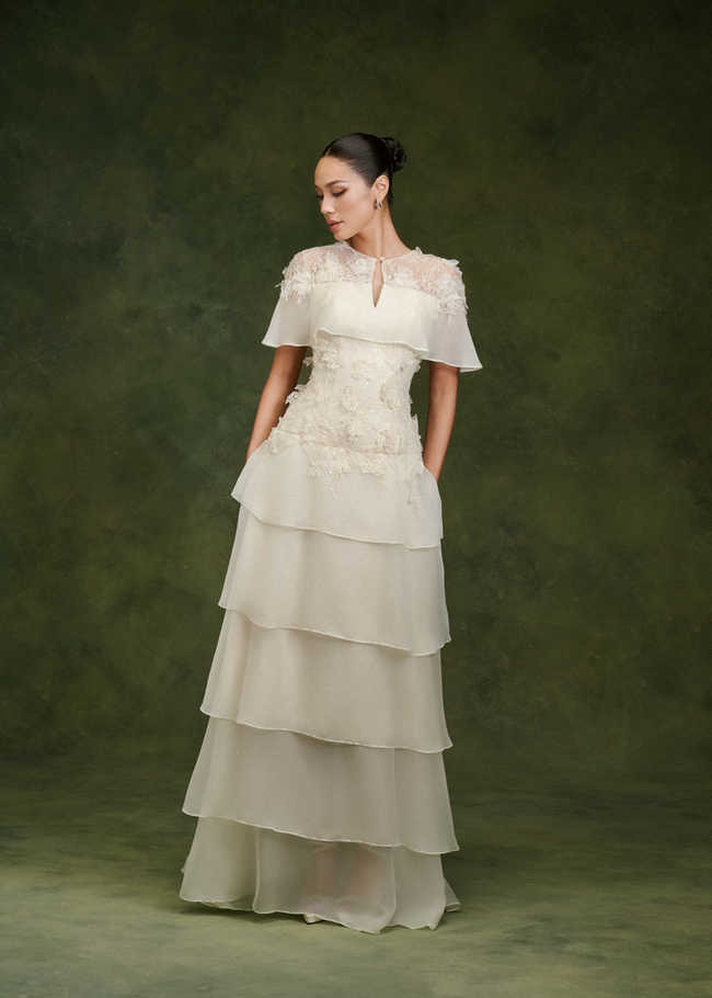 LARMES Mirra tiered dress in cream – front view, full length with chiffon capelet