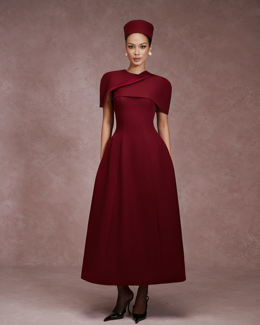 LARMES Edith cape-shoulder midi dress in burgundy – front view, full length, with pillbox hat
