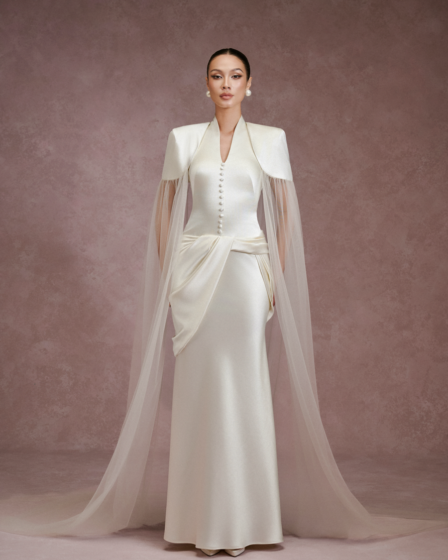 LARMES Ziva satin halter dress in ivory – front view, full length with shoulder cape